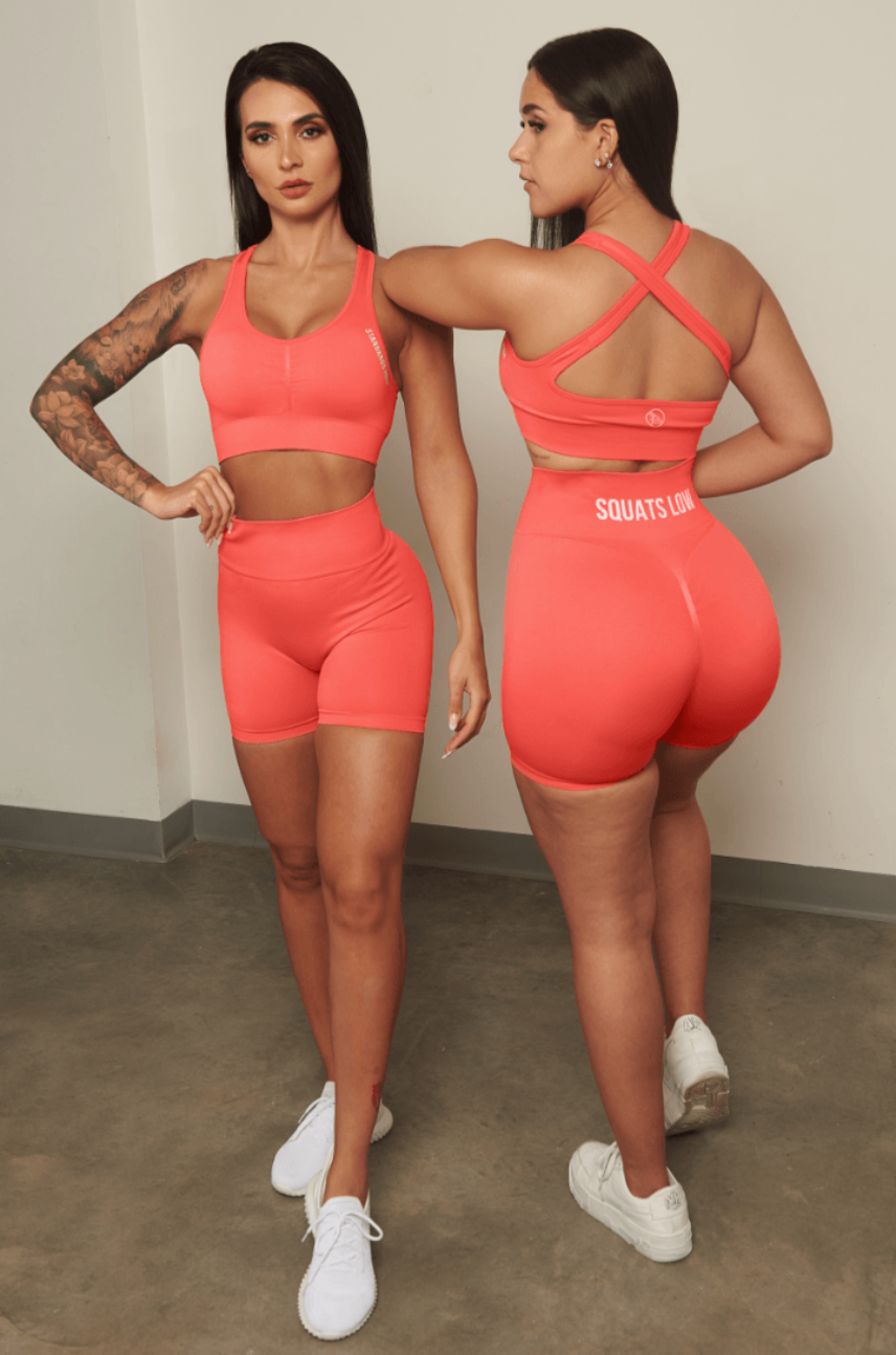 Keep your Standards High & Squats Low & stand the f*ck out out in the weight room in our Coral Squats Low Seamless Scrunch Shorts