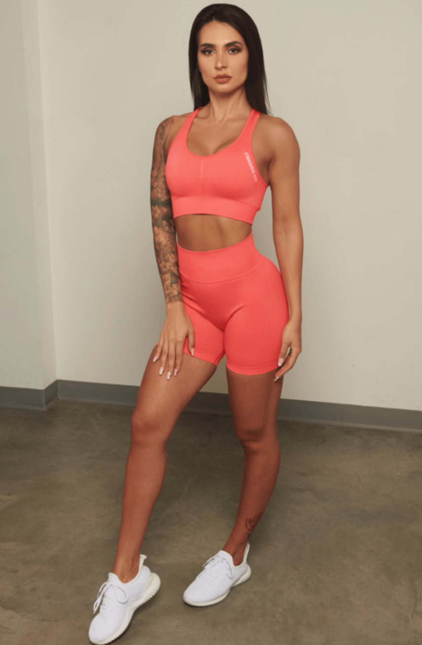 Keep your Standards High & Squats Low & stand the f*ck out out in the weight room in our Coral Squats Low Seamless Scrunch Shorts