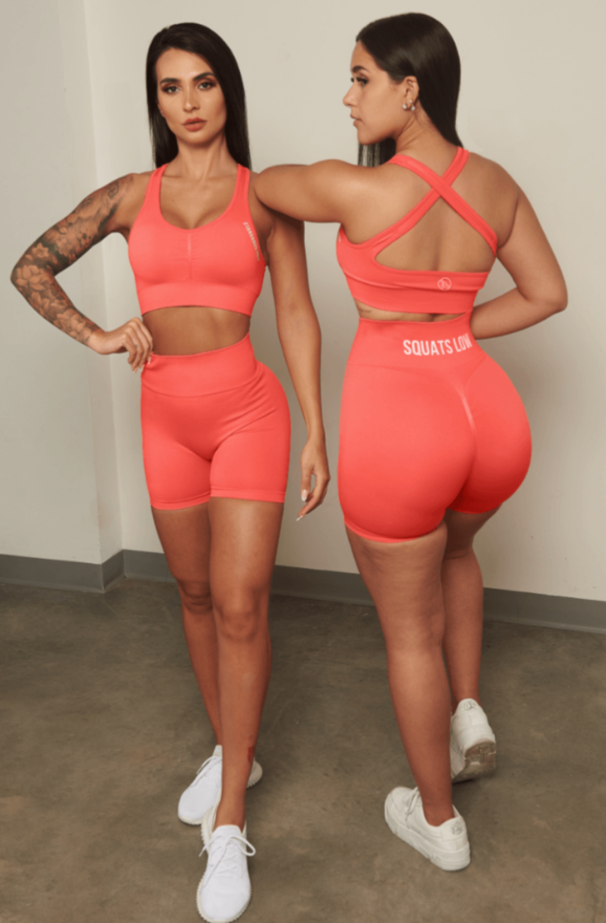 Keep your Standards High & Squats Low & stand the f*ck out out in the weight room in our Coral Standards High Seamless Scrunch Sports Bra