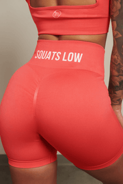 Keep your Standards High & Squats Low & stand the f*ck out out in the weight room in our Coral Squats Low Seamless Scrunch Shorts